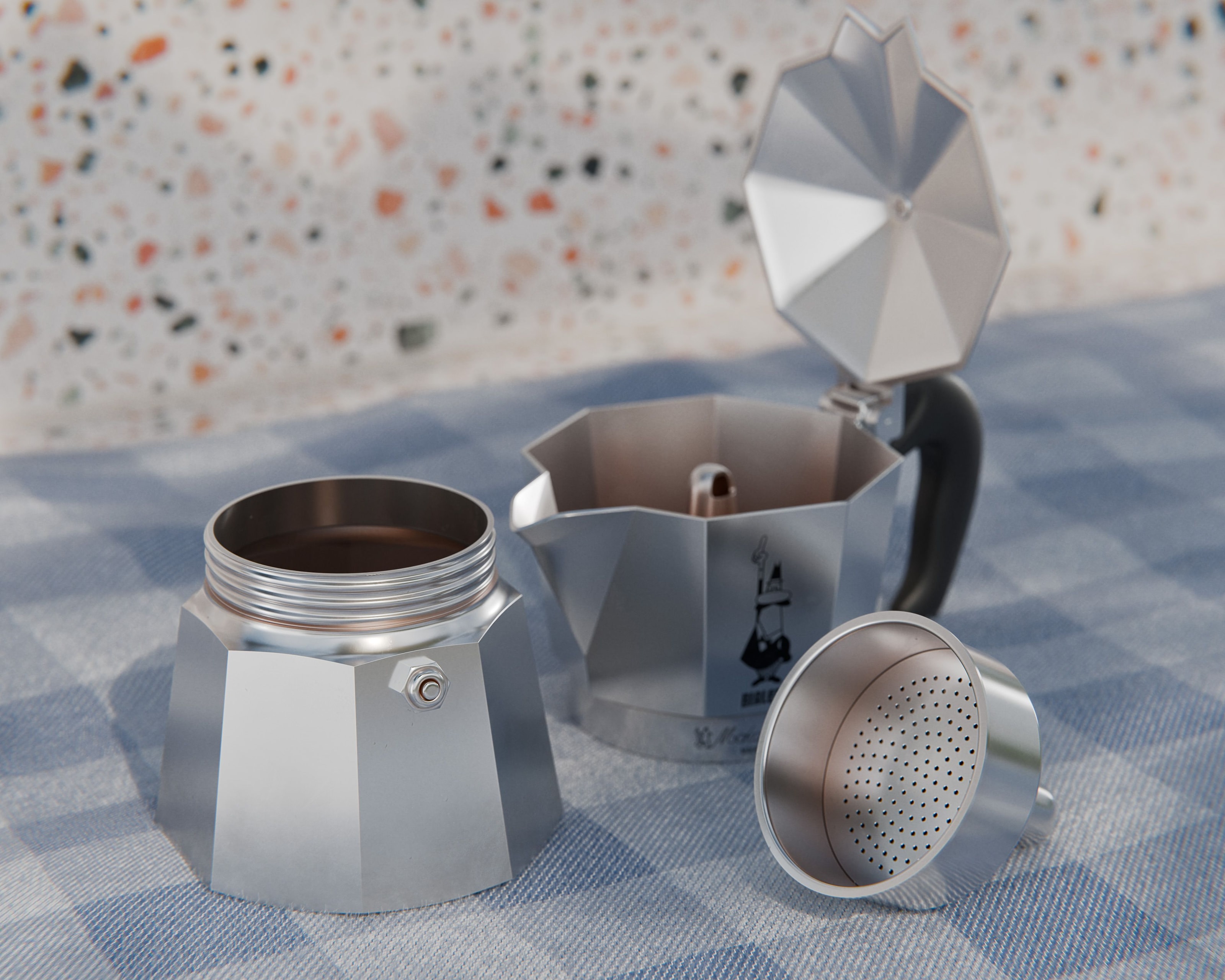 Rendering of a disassembled Bialetti Moka Express